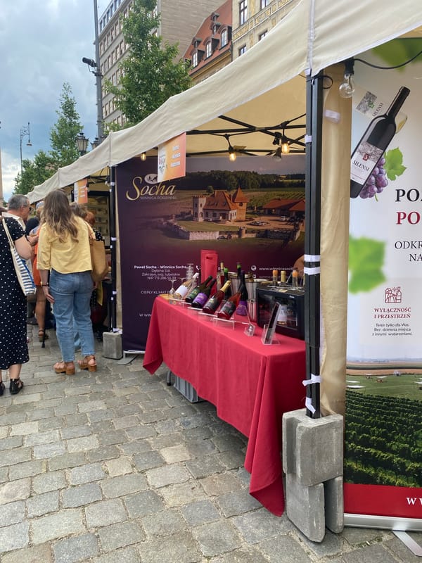 Outdoor market activity captured in Wrocław city center