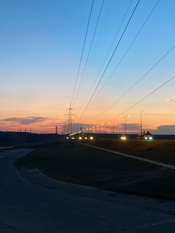 Evening power lines and pathways documented in Chaikovsky