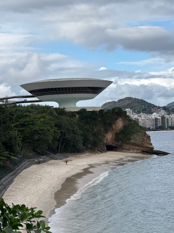 Niterói coastline: art museum, rocky hills, and calm water