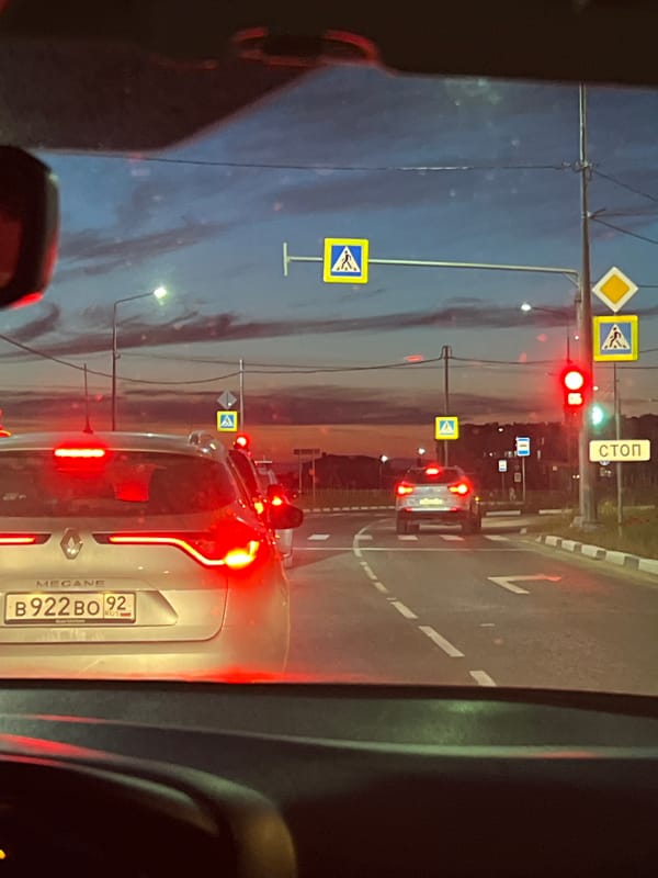 Evening drive through suburbs during sunset with traffic delays