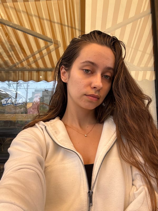 Woman documents morning cafe visit in Ramat Gan