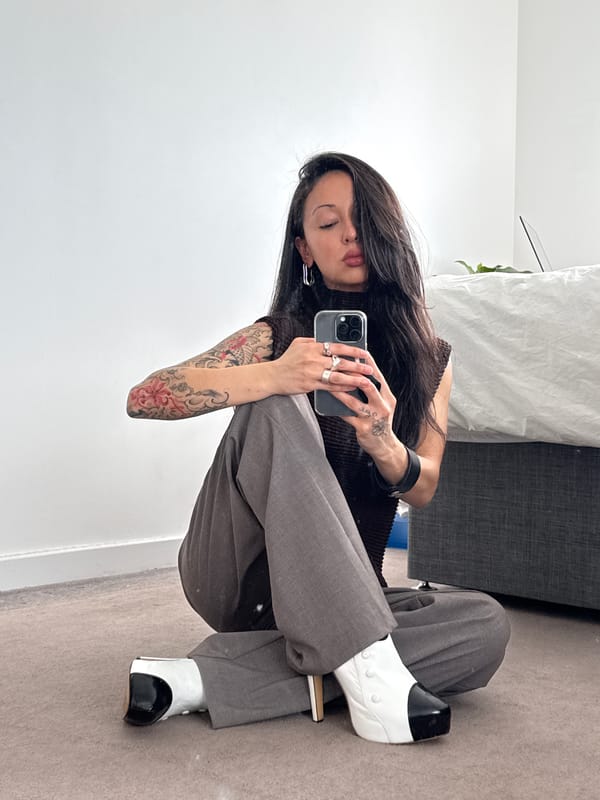 Person takes mirror selfie at London residence
