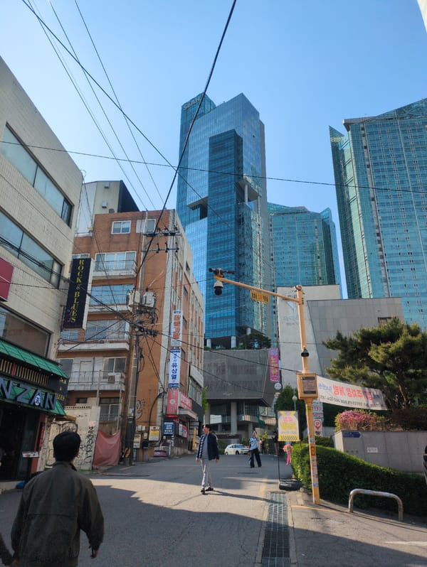 Morning street scene captures Seoul's architectural mix