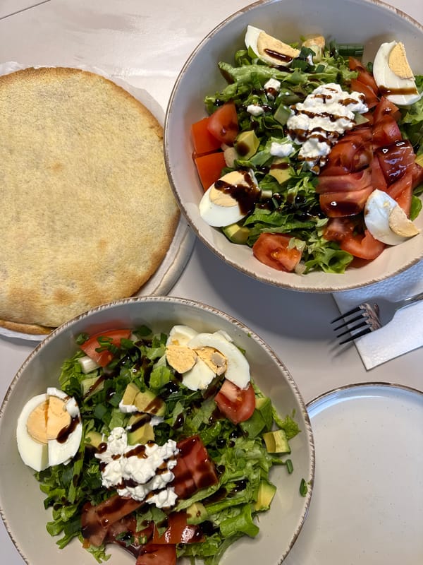 Home meal with salads and flatbread documented