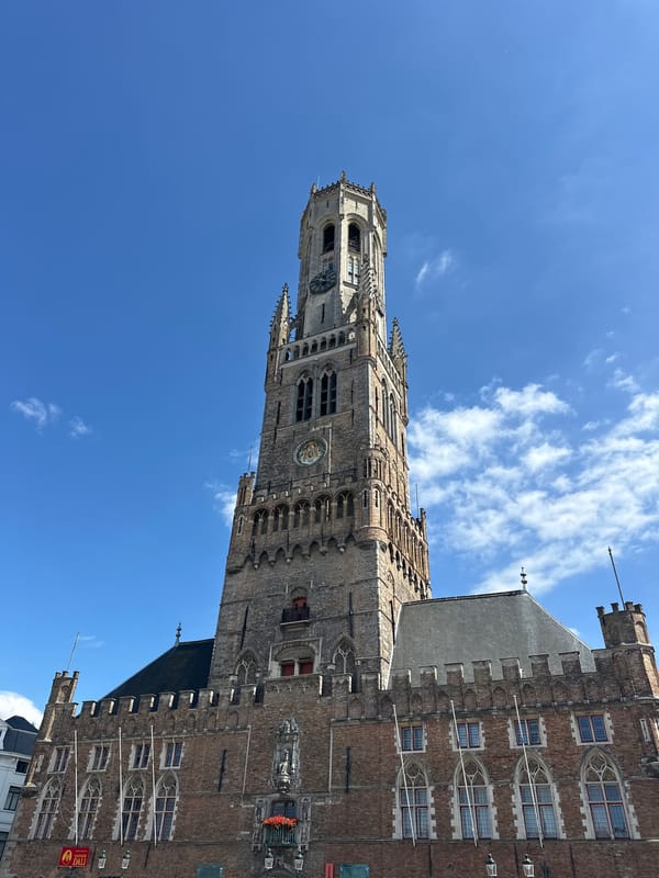 Bruges' Markt Square on a sunny summer afternoon