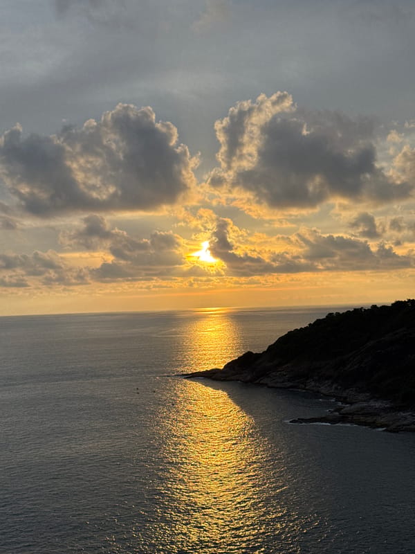 Sunset gathering at Promthep Cape viewpoint in Rawai
