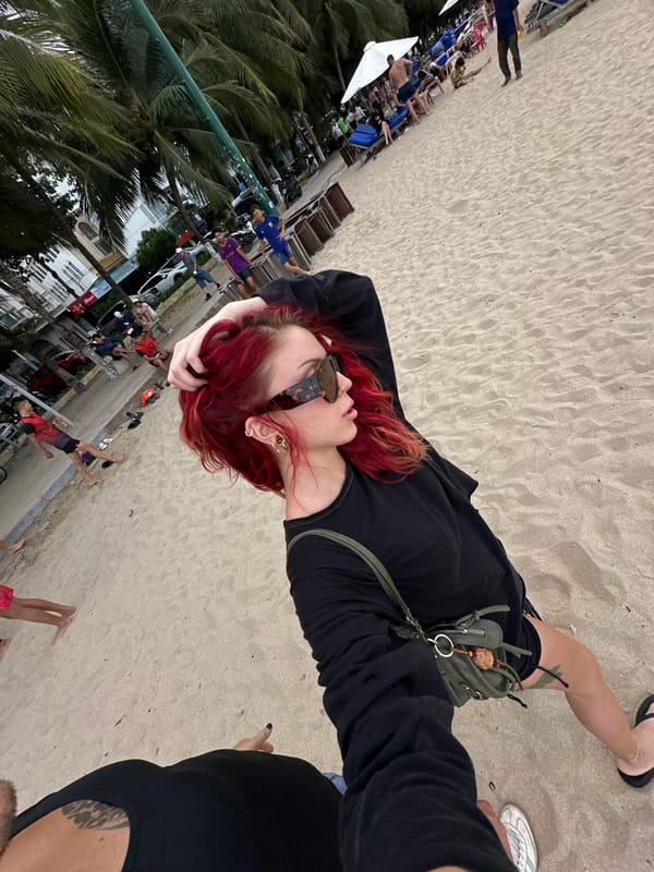 Casual beach morning in Nha Trang with paddleboards and crowds