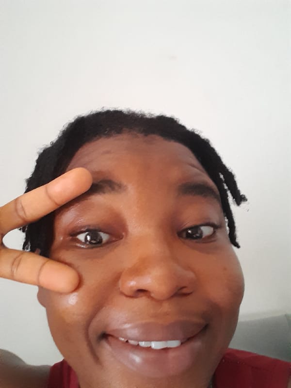 Portrait photograph captured in Umuigbekwo, Nigeria shows smiling person