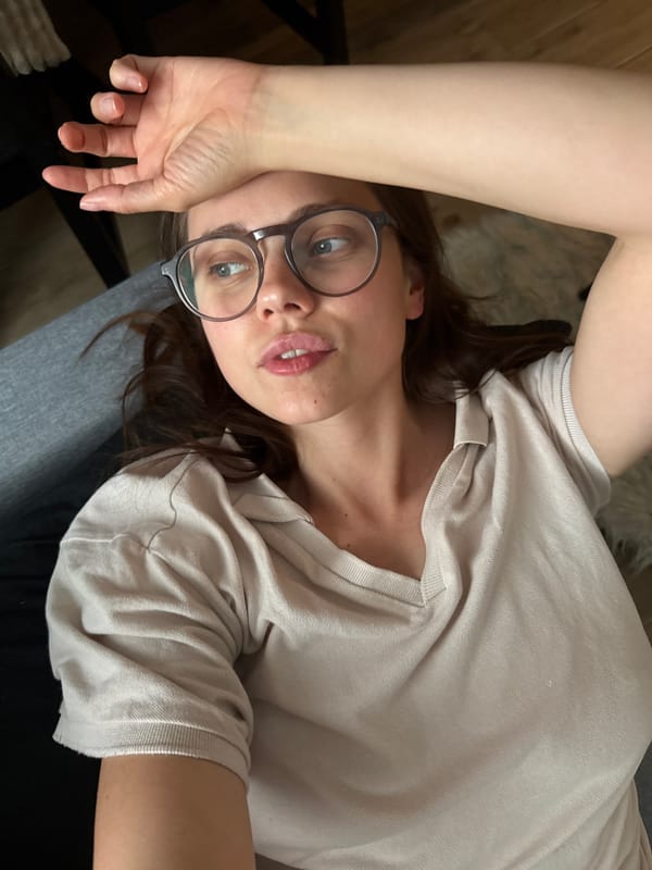 Woman rests on couch in Vrchlabí home