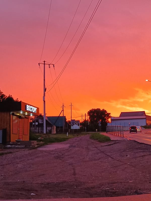Sunset and rainbow over Tatarskaya Kargala streets