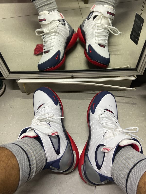 Athletic sneakers photographed in mirror reflection in Higuerote, Venezuela