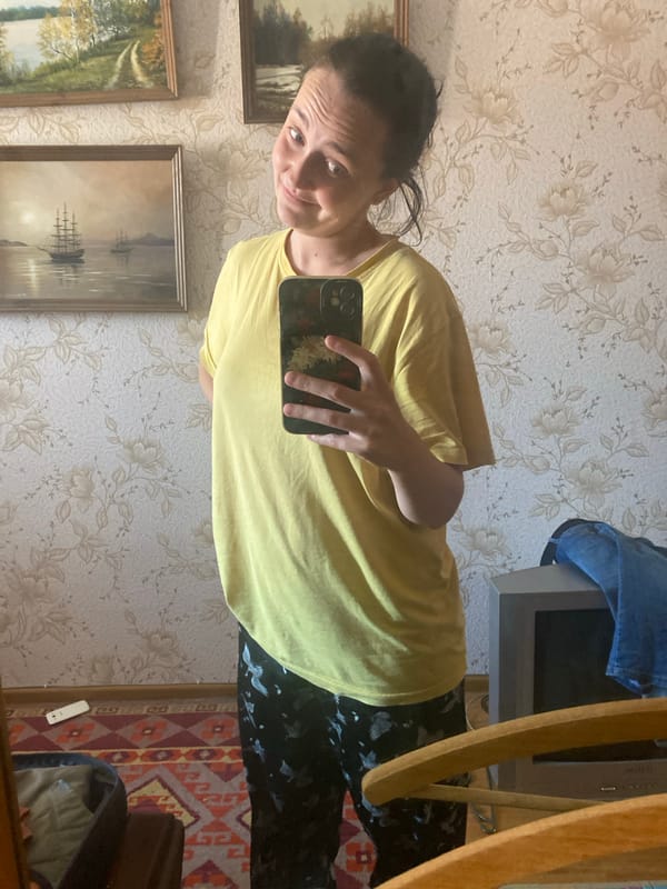 Quick selfie series in a yellow tee, various poses