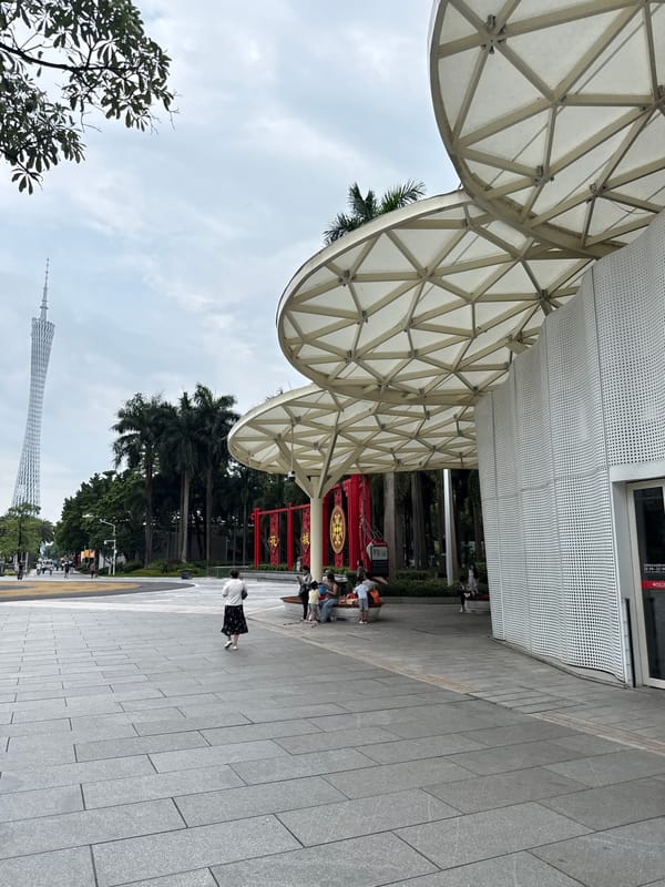 Guangzhou's Tianhe skyline from street level, June 2026