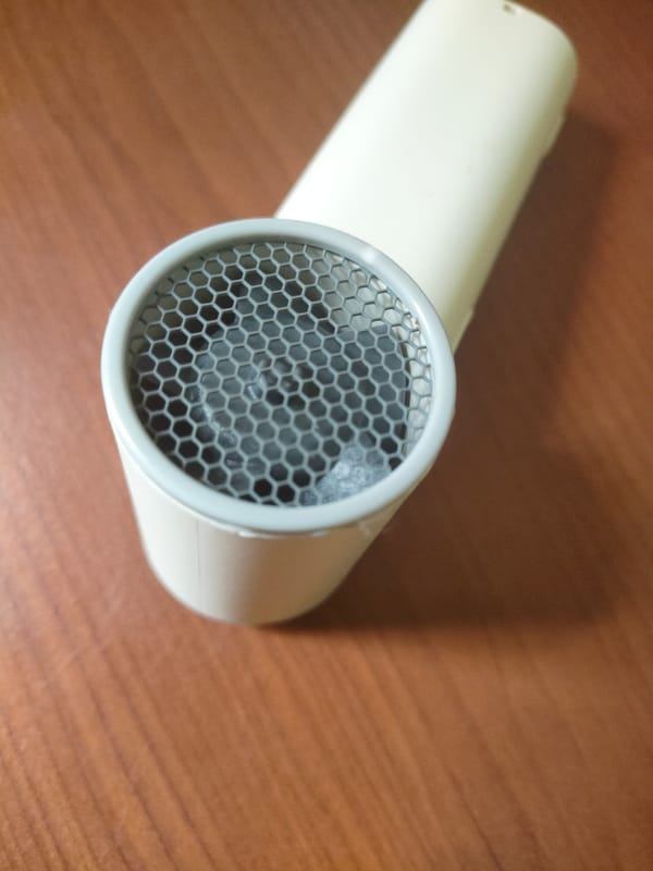 Everyday objects photographed up close on various surfaces