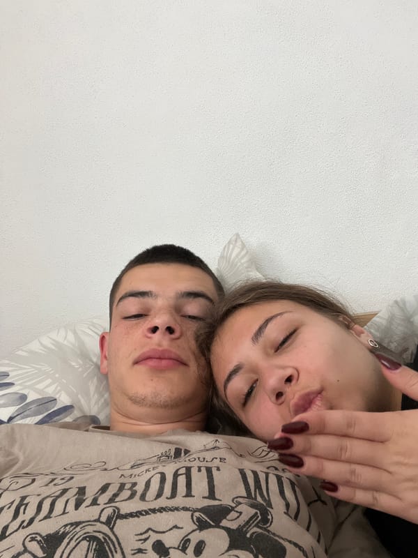 Couple photographed together on bedding in Karavelovo, Bulgaria