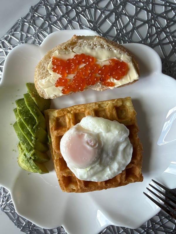 Avocado and egg waffle breakfast, plated up in Khimki