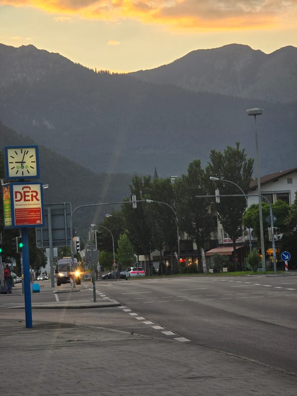 Garmisch-Partenkirchen at golden hour, streets to alpine skyline