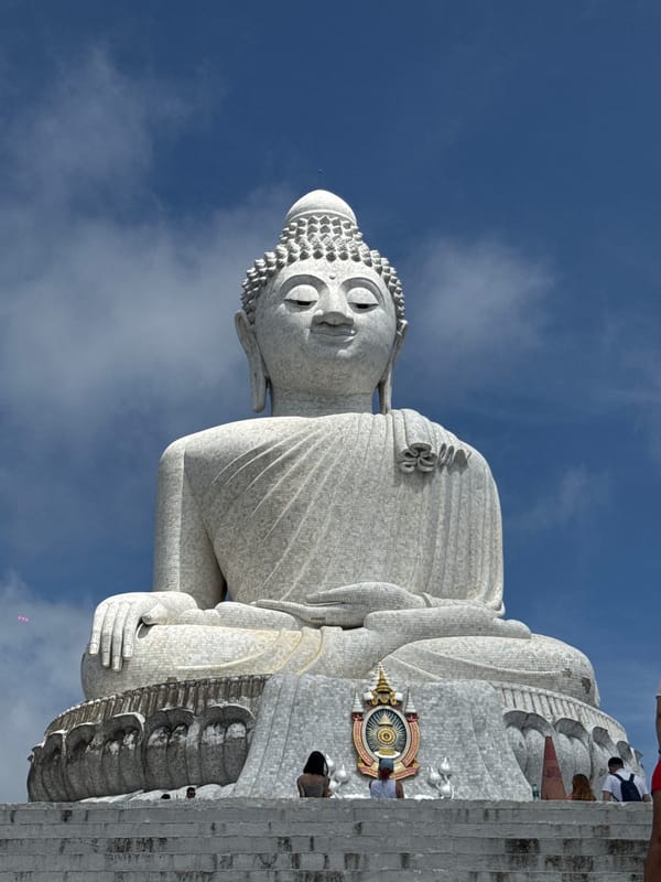 Tourists photograph Great Buddha statue in Chalong, Thailand