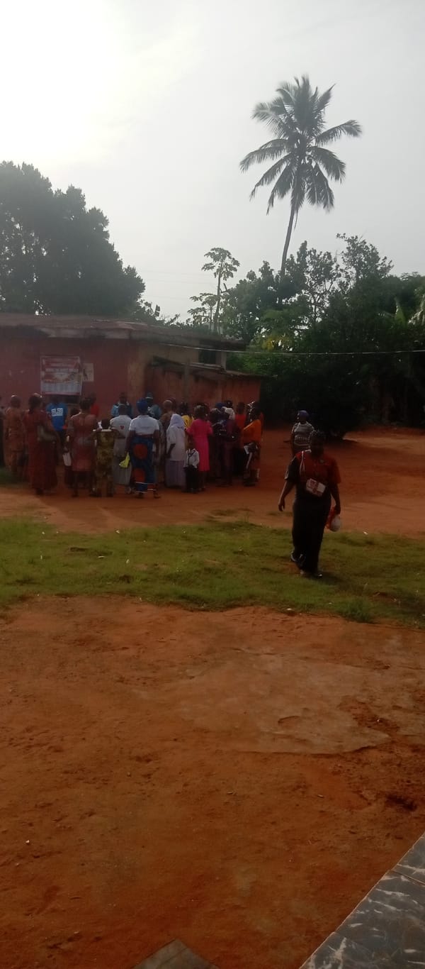 Morning gathering of women in traditional dress in Nkpor