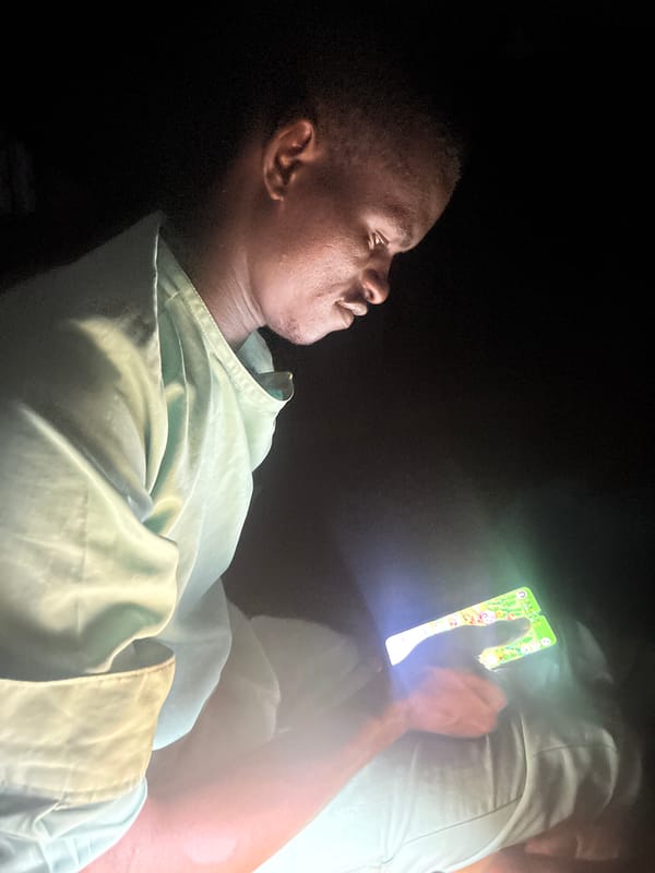 Nighttime social gathering documented through selfies in Epe, Nigeria