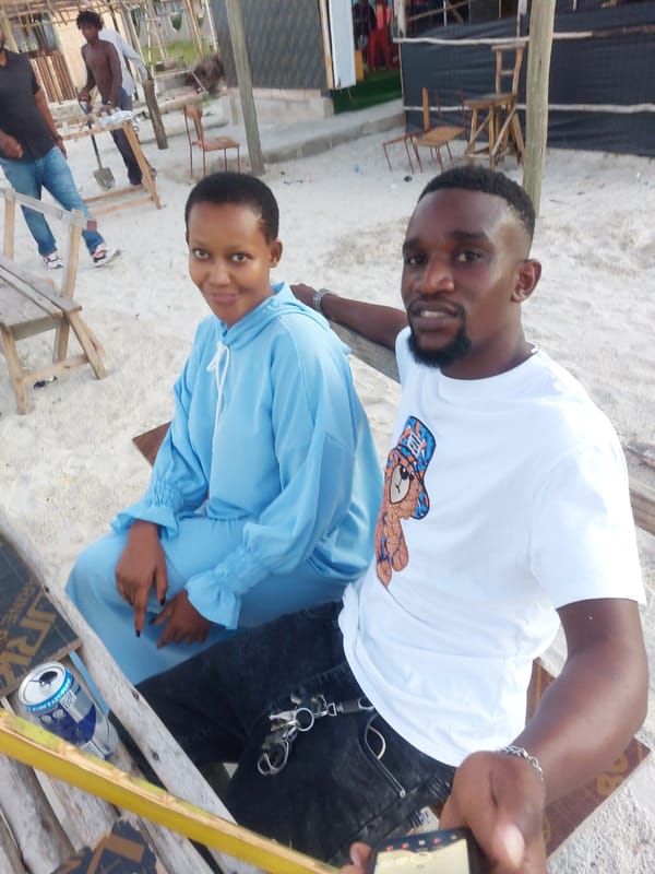 Beachgoers enjoy casual moments at Dar es-Salaam coastline