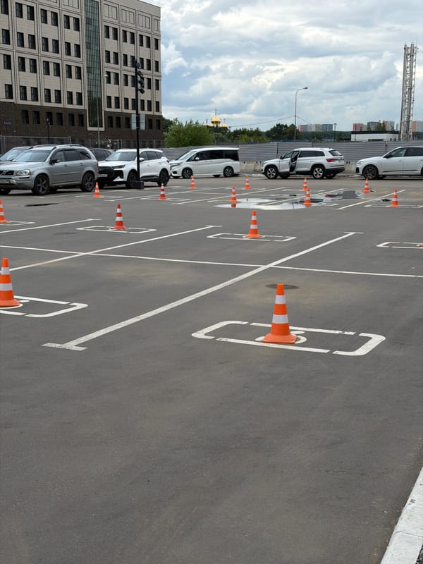 Coned-off parking lot under grey Moscow skies