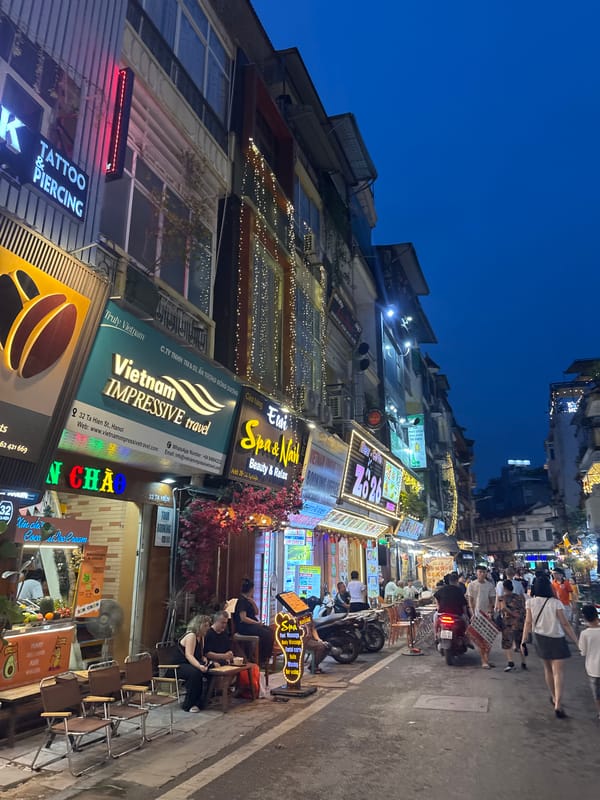 Hanoi's Old Quarter and lakeside at dusk, music and motion