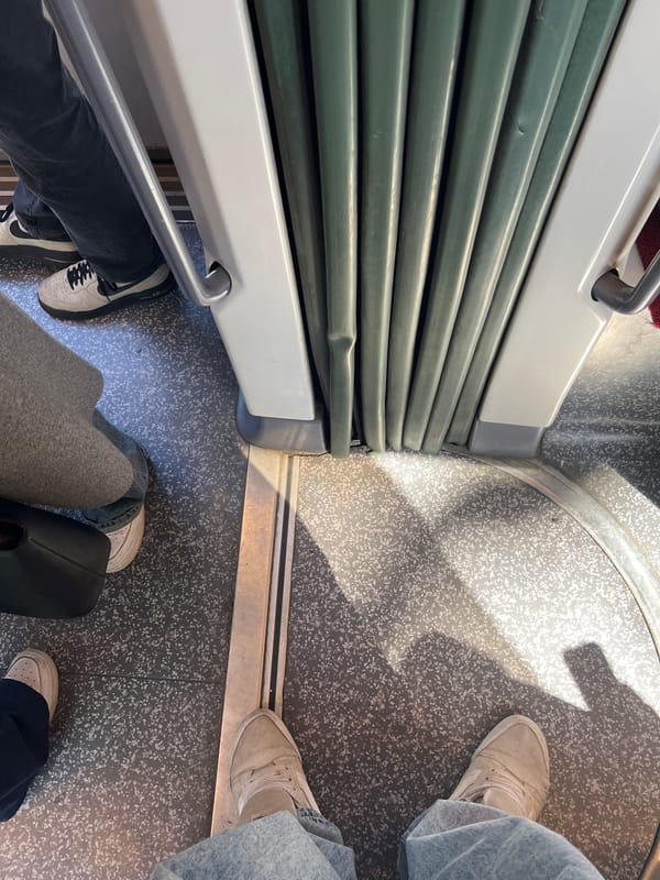 Passengers ride Strasbourg tram during morning commute