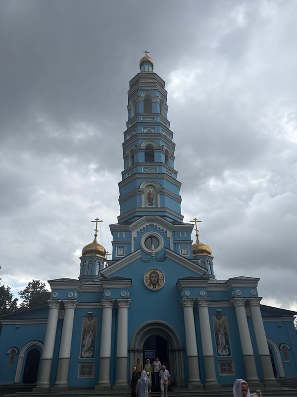 Religious sites and ornate floral arrangements in an urban setting