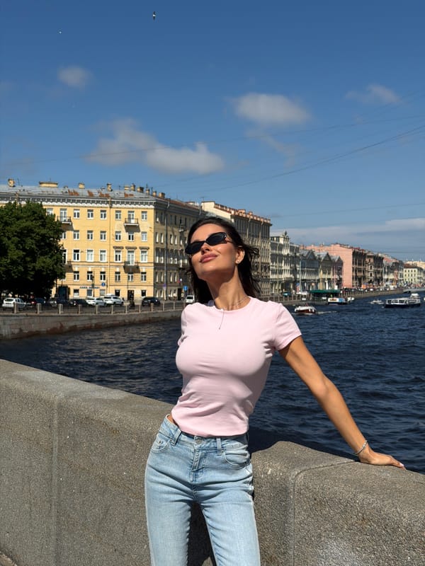Woman in casual attire observed on Saint Petersburg embankment