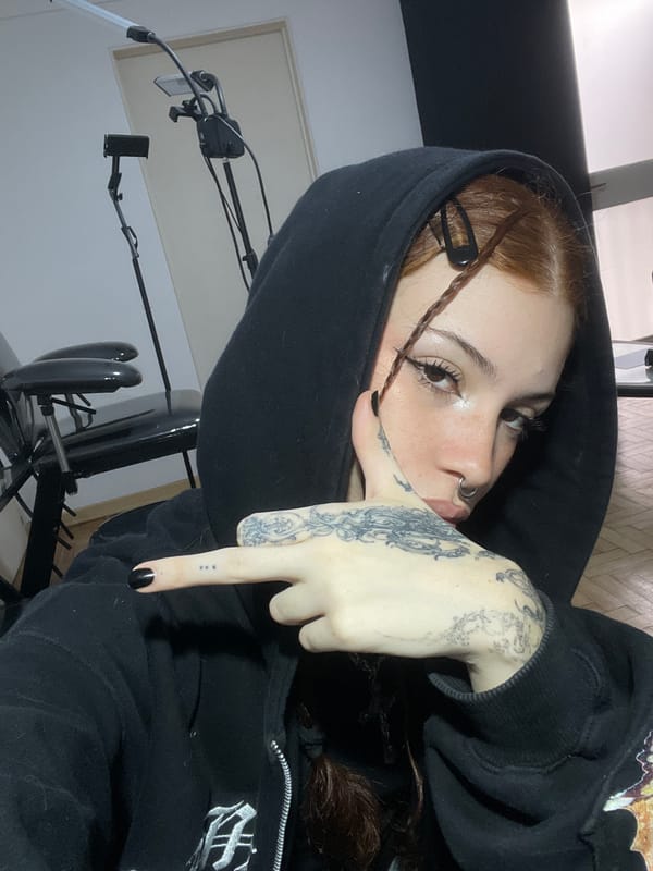 Woman Takes Selfie in Buenos Aires Indoor Location