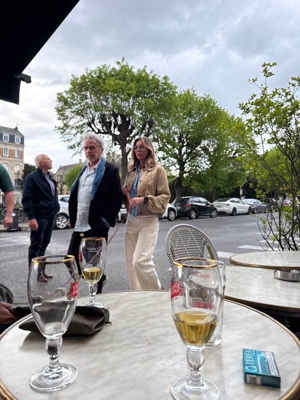 Outdoor cafe scene captured in Reims, France