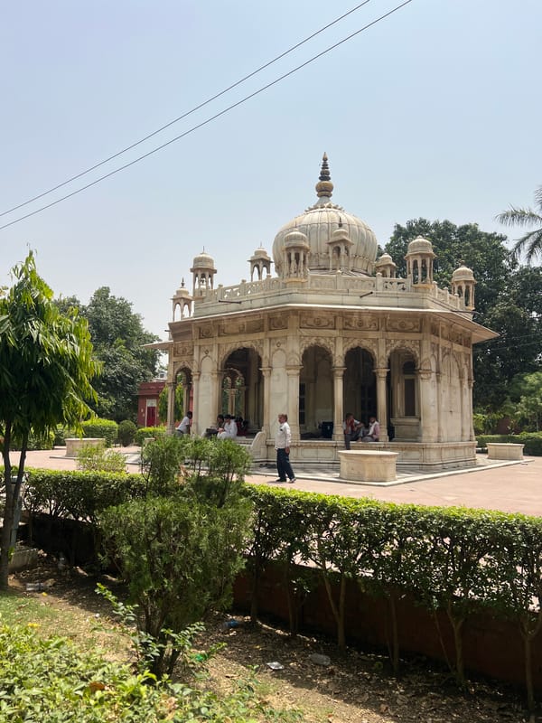 Morning gathering at marble monument in Varanasi documented