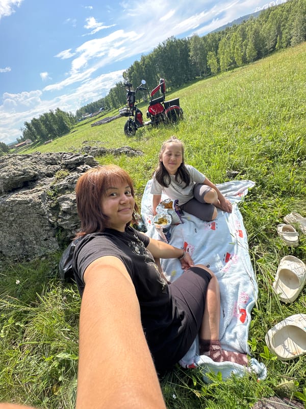 Country picnic and garden exploration under dramatic June skies