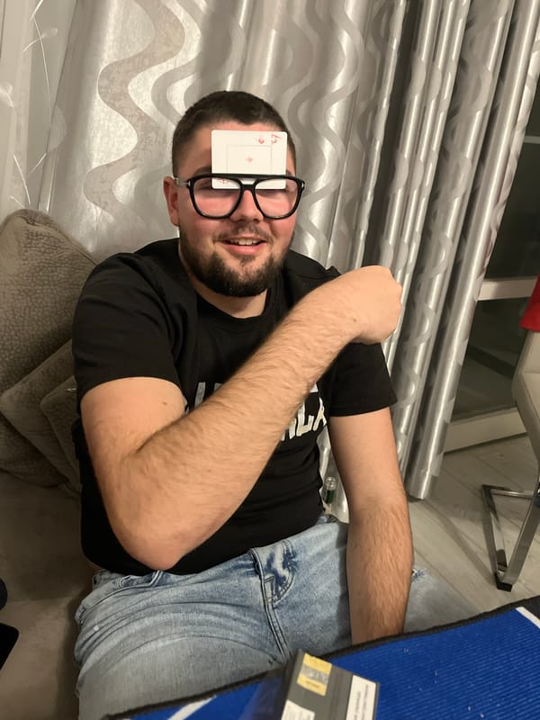 Man plays card guessing game in Burgas apartment