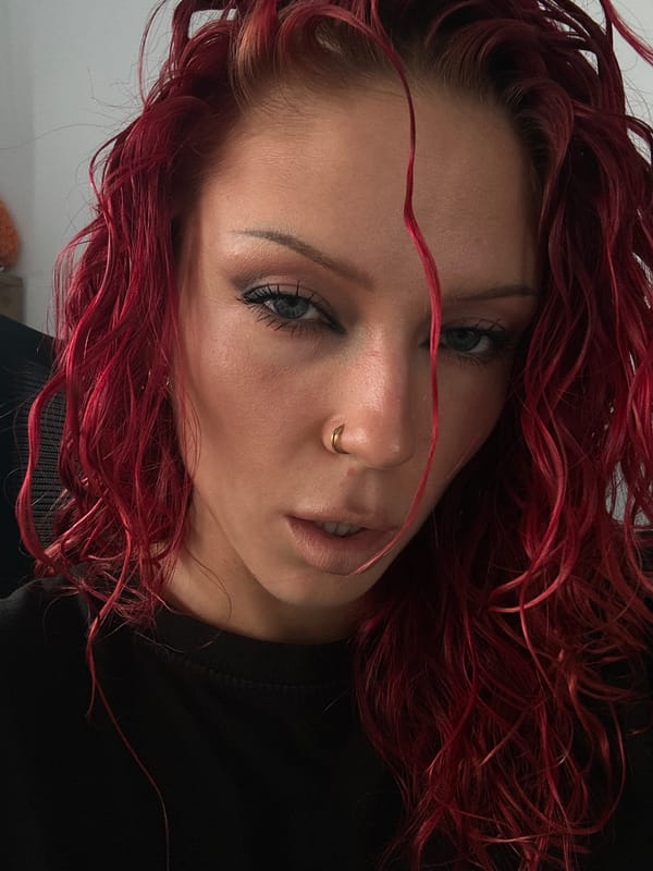 Quick selfie session in North Kuta, red hair, indoor light