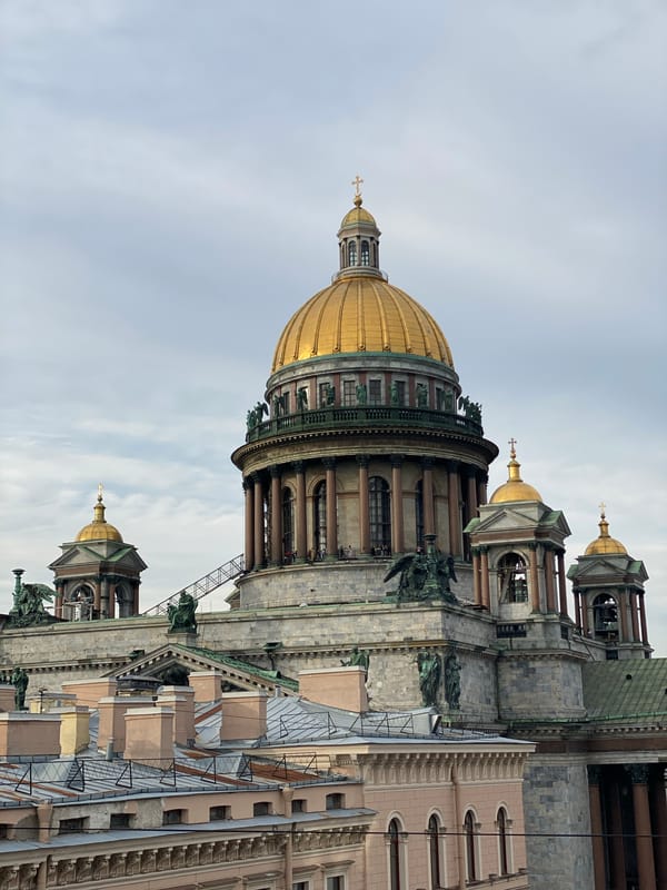 Rooftop drinks with St. Isaac's Cathedral as the backdrop