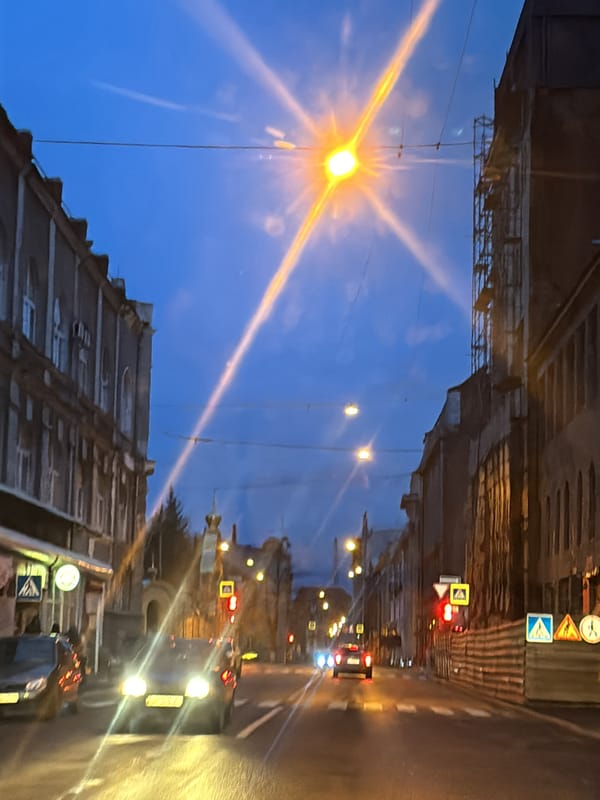 Evening street scenes captured from vehicle in Kharkiv