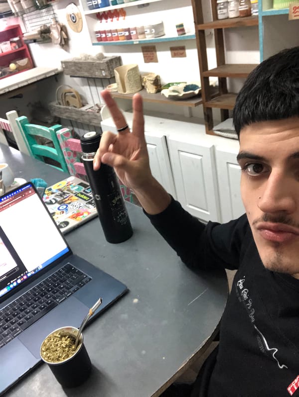 Person makes peace sign gesture in Beccar selfie