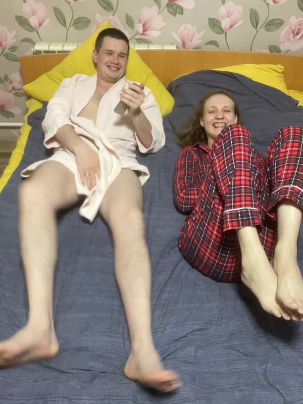 Two people observed on bed in Sharkan, Russia