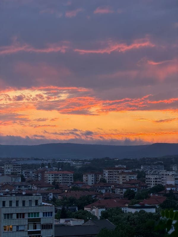 Dramatic sunset illuminates Lovech, Bulgaria cityscape