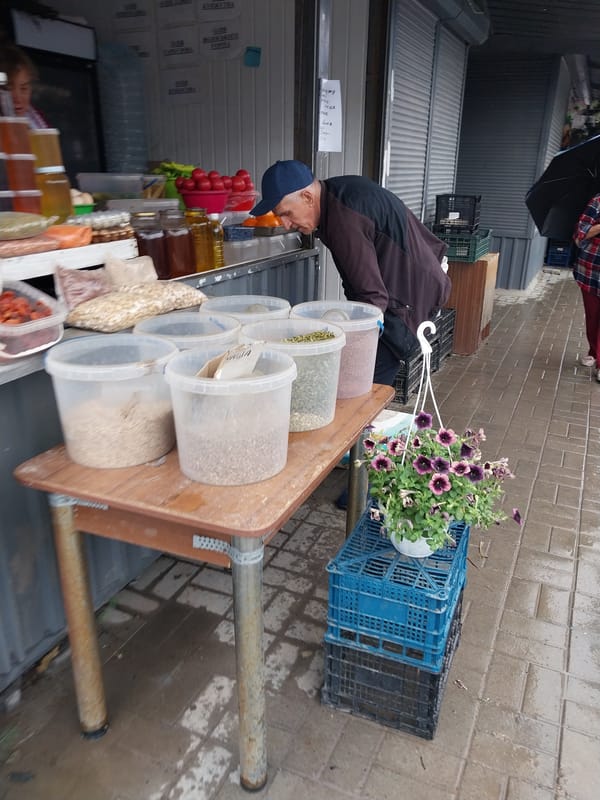 Rainy morning around a Dnipro neighborhood market