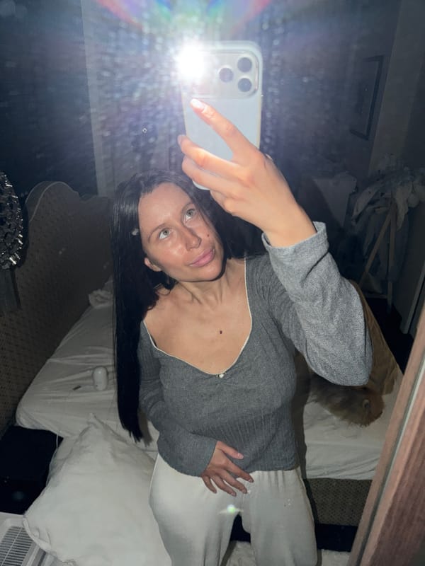 Woman takes mirror selfie in Khimki, Russia