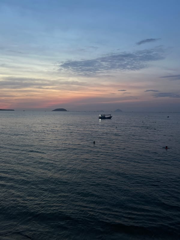 Evening waterfront gathering captured in Nha Trang, Vietnam