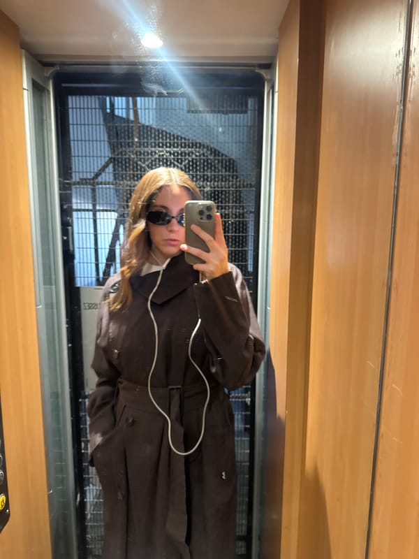 Woman takes elevator selfie in Paris