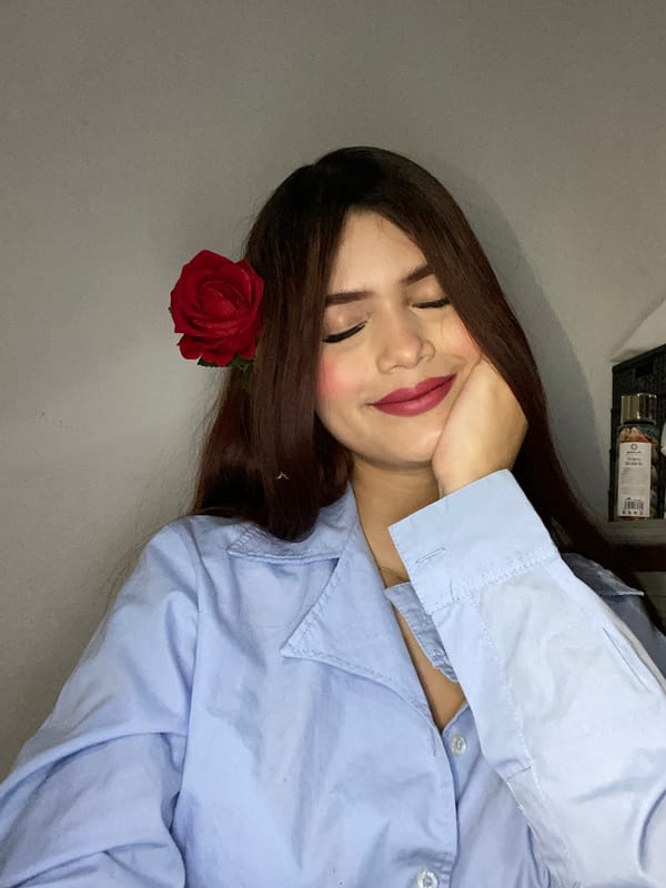 Person rests indoors in Juan Griego during quiet morning