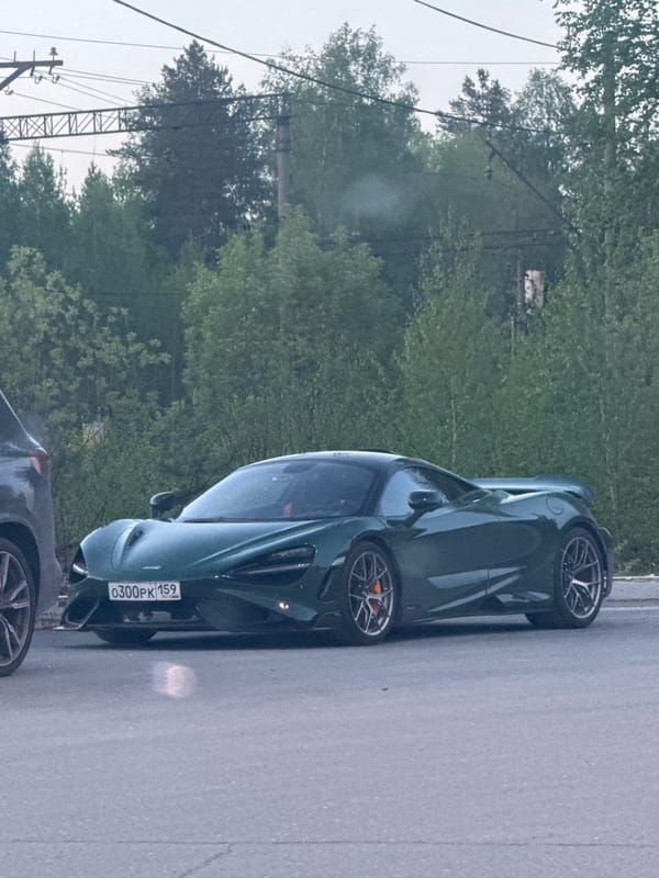 Green McLaren sports car spotted parked in Perm, Russia