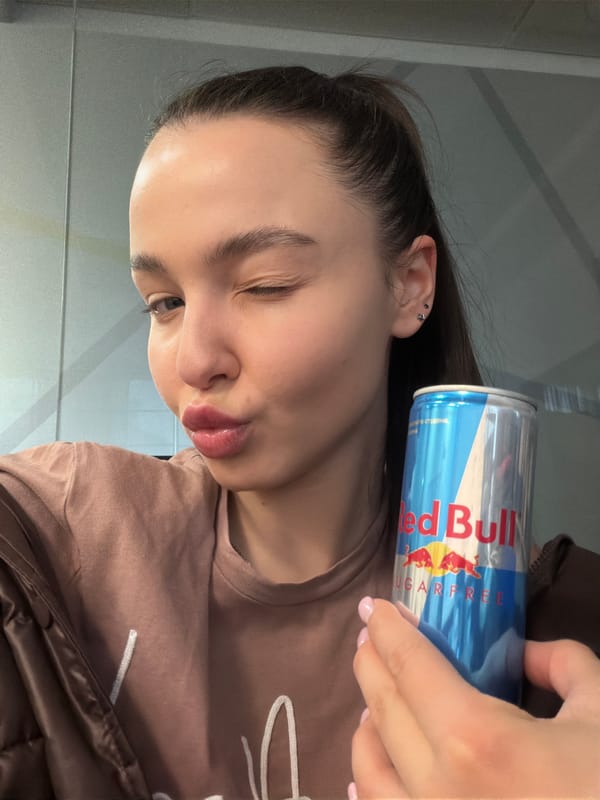 Woman takes early morning selfies with energy drink in Sofia