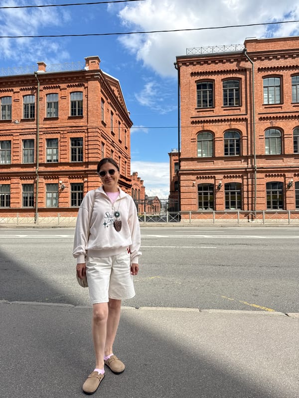 Street-level snapshots of Saint Petersburg's brick and dome architecture