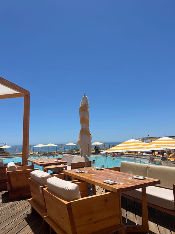 Lunch on a sun-drenched ocean-view terrace in Almancil